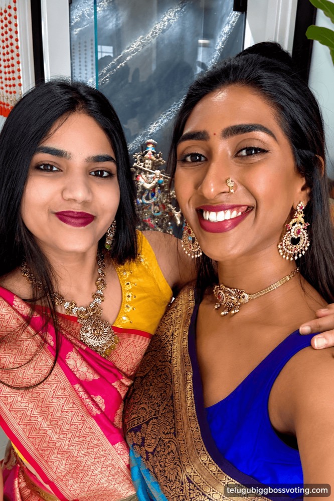 Illustrated selfie-style portrait of Shalini Damera with a friend, both in festive sarees